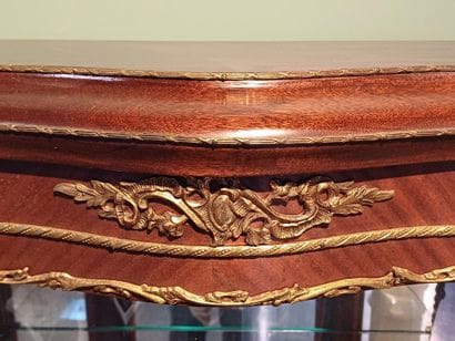 A three-sided-glazed, curved display case...