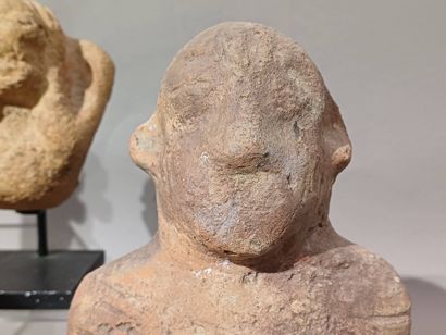 Lot of four West African objects: a seated...