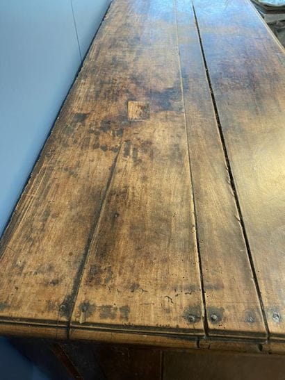 Moulded natural wood sideboard opening to...