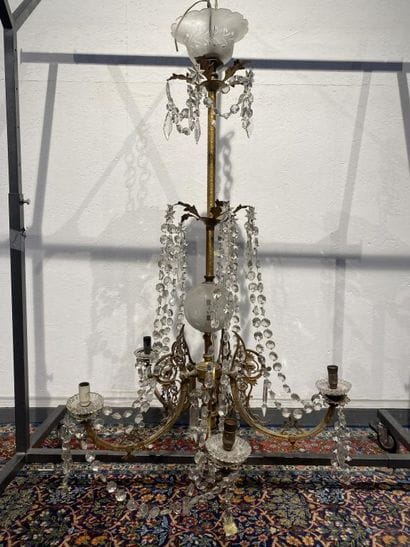 Brass chandelier with five foliate scrolled...