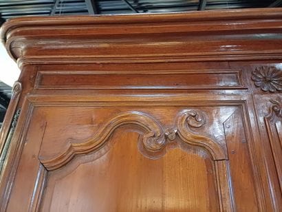 Large cabinet in molded and carved cherrywood,...
