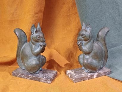 M. FONT 
Pair of regule bookends depicting...