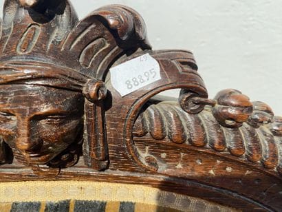 Oak armchair with carved Indian head, lion's...
