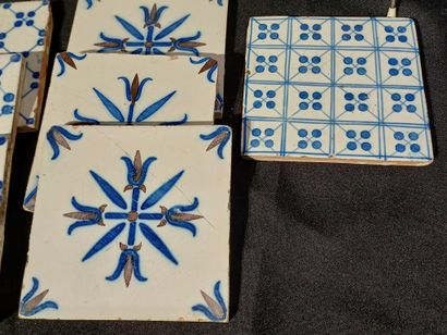 Set of 14 earthenware tiles with blue or...