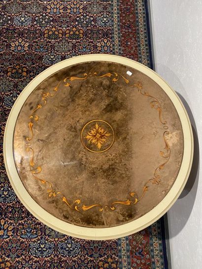 Round table in molded, carved and cream and...