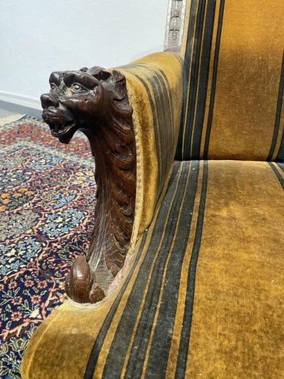 Oak armchair with carved Indian head, lion's...