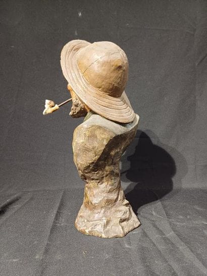 Polychrome patinated plaster bust of a man...
