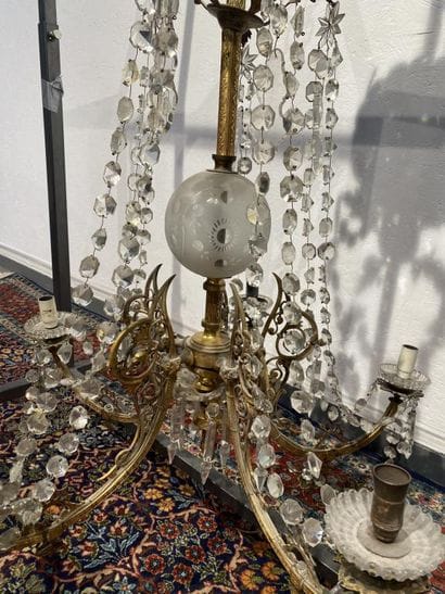 Brass chandelier with five foliate scrolled...