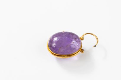 Opening pendant in yellow gold set with two...