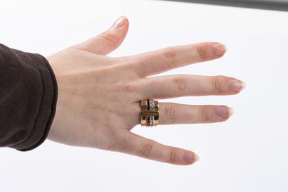 Yellow gold and platinum geometric tank ring...