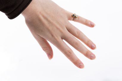 toi et moi gold ring set with a round sapphire...