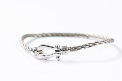 FRED 
Gold and steel bracelet 
