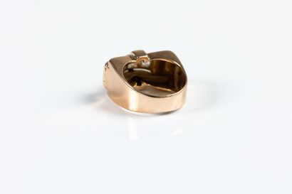 Gold tank ring centered with a line of old-cut...