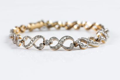 Drop bracelet in yellow gold and platinum...