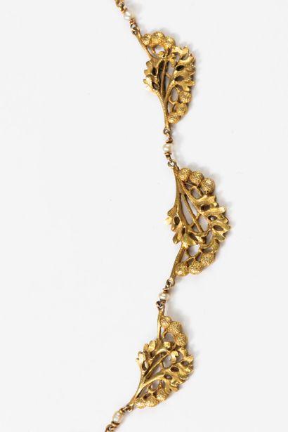 Yellow gold drapery necklace with foliate...