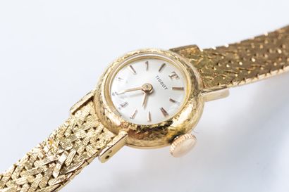 TISSOT circa 1960
Yellow gold wristwatch,...