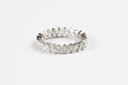 Wedding band set in platinum, with navette-cut...