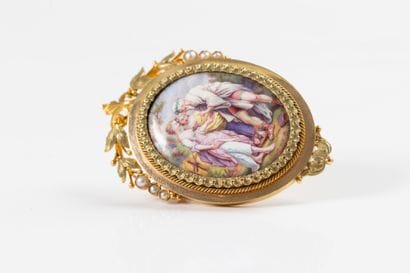 Colored gold pendant brooch centered on a...