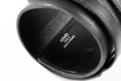 HERMES
Black leather cuff bracelet, fastened...
