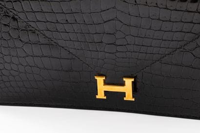 HERMES, Paris
Lydie clutch bag in black crocodile...