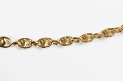 Stylized coffee bean necklace in yellow gold....