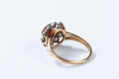 Yellow gold and platinum daisy ring centered...