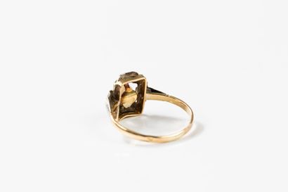 Delightful gold ring centered with a 4.2...