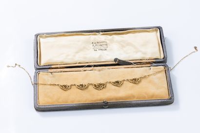 Yellow gold drapery necklace with foliate...