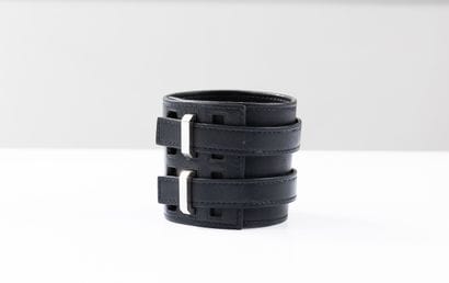HERMES
Black leather cuff bracelet, fastened...