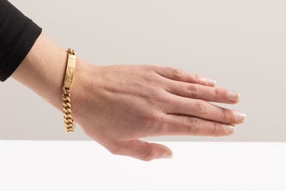 Identity bracelet in yellow gold centered...