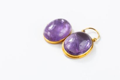 Opening pendant in yellow gold set with two...