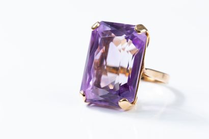 Yellow gold ring set with a large rectangular...