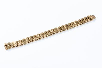 Massive gourmette bracelet in yellow gold....