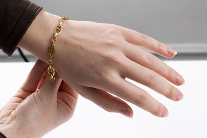 Yellow gold bracelet decorated with filigree...