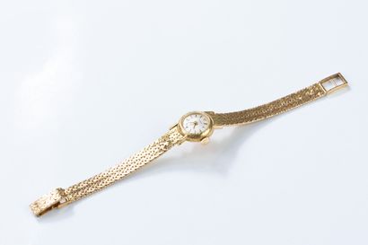 TISSOT circa 1960
Yellow gold wristwatch,...