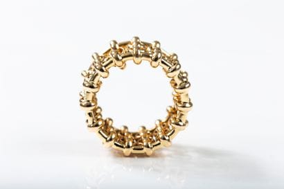 CHANEL 
Yellow gold band ring with jaseron...