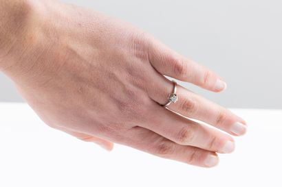 White gold solitaire ring set with a brilliant-cut...