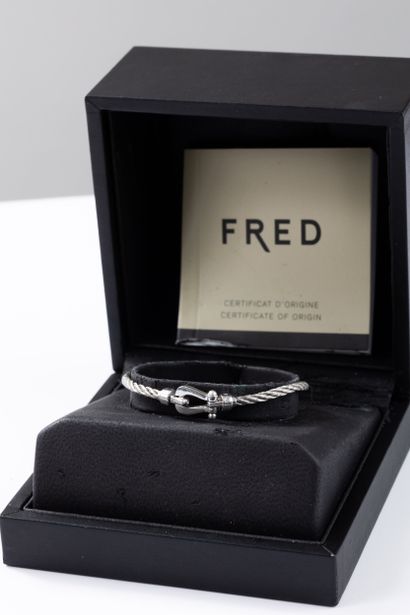 FRED 
Gold and steel bracelet 