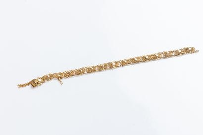 Yellow gold bracelet decorated with filigree...