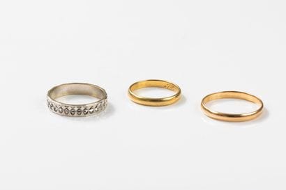 Gold lot comprising two yellow gold wedding...