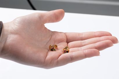Pair of earrings each set with a ruby, an...