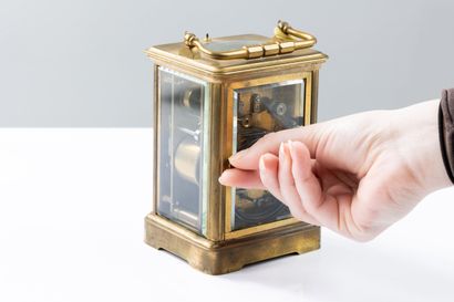 Travel clock with large and small chimes,...