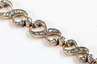 Drop bracelet in yellow gold and platinum...