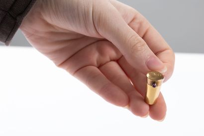 Opening conical pendant charm in yellow gold,...