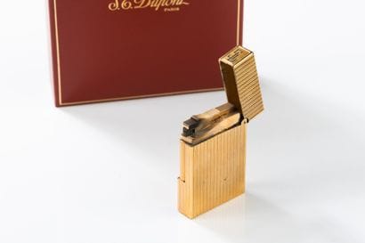 ST DUPONT
A set of three lighters, one in...
