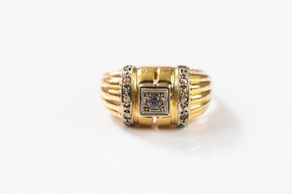 Yellow gold band ring with gadroons set with...