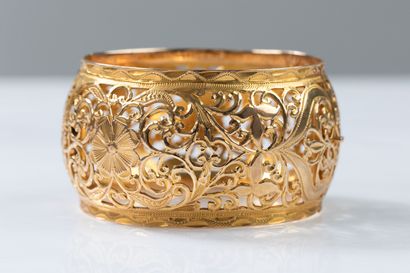Yellow gold cuff bracelet with floral and...