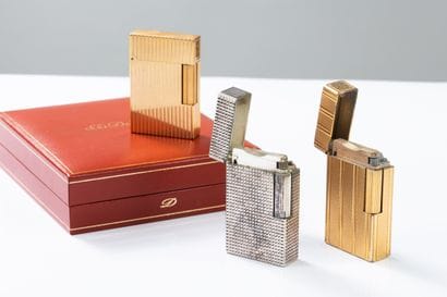 ST DUPONT
A set of three lighters, one in...