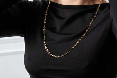 Stylized coffee bean necklace in yellow gold....