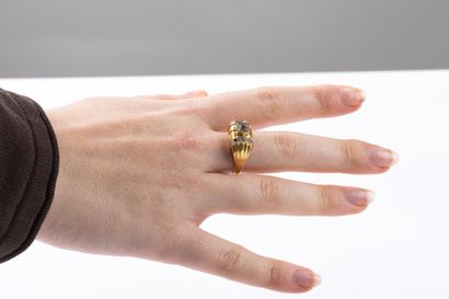 Yellow gold band ring with gadroons set with...